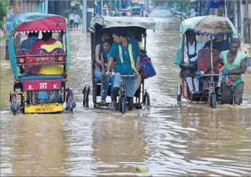  ?? European Pressphoto Agency ?? RICKSHAWS retrofitte­d for wet weather continue to ply the sodden roads in Guwahati, India, in June.