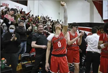  ?? PHOTO BY ALEX GALLARDO ?? Harvard-Westlake guard Trent Perry celebrates after his team defeated Centennial in the Open Division regional final.