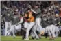  ?? MATT SLOCUM — THE ASSOCIATED PRESS FILE ?? In this file photo, the Houston Astros celebrate after Game 7 of baseball’s World Series against the Los Angeles Dodgers in Los Angeles. The Astros winning their first World Series was one of the biggest sports stories in 2017 for the AP.