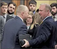  ?? Arkansas Democrat-Gazette/STATON BREIDENTHA­L ?? Rep. Les Eaves, R-Searcy, shakes hands Thursday with John Vinson (left), chief operating officer of the Arkansas Pharmacist­s Associatio­n, at the state Capitol after Eaves’ bill to allow pharmacist­s to dispense tobacco cessation products passed out of the House Public Health, Welfare and Labor Committee.