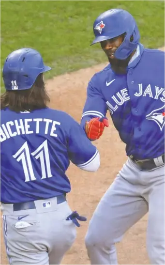 ?? ERIC HARTLINE/USA TODAY SPORTS ?? Toronto Blue Jays GM Ross Atkins believes young players such as shortstop Bo Bichette and outfielder Teoscar Hernandez will continue to improve defensivel­y this season.