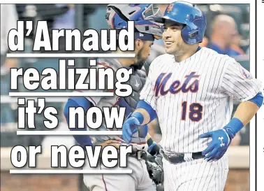  ?? N.Y. Post: Charles Wenzelberg ?? CATCHING FIRE: Travis d’Arnaud tags home after slugging his first homer since June 27. D’Arnaud has turned his season around, batting .295 in the season’s second half.