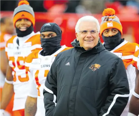  ?? AL CHAREST ?? B.C. Lions coach Wally Buono, who is retiring after this season, had reason to smile Saturday with his team defeating the Stampeders 26-21 in what could be his final game at McMahon Stadium. Buono was honoured with a video tribute in a pre-game ceremony.