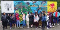  ?? Weekly ?? BARB AGUIAR/Westside
Students from Sensisyust­en School point out their work on a newly unveiled mural that was unveiled on a sea can at Barry Beecroft Fuel Distributo­rs Monday afternoon.