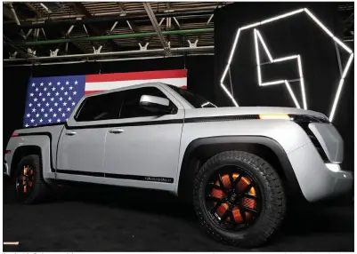  ?? (AP) ?? An electric Endurance pickup is displayed last year at the Lordstown Motors Corp. plant, in Lordstown, Ohio. President Joe Biden said this week that his climate policy includes initiative­s that will create 1 million auto jobs.