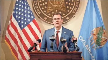  ?? SARAH PHIPPS/THE OKLAHOMAN ?? Gov. Kevin Stitt speaks at a news conference in 2020.