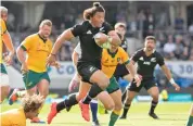  ??  ?? New Zealand's Caleb Clarke makes a break during the second Bledisloe Cup rugby Test against Australia at Eden Park in Auckland, on Sunday