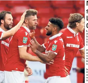  ??  ?? Good job: Nottingham Forest’s Daryl Murphy (second from left) celebratin­g with his teammates after scoring his first goal against Newcastle in the League Cup on Wednesday. — Reuters