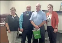  ?? / Sean Williams ?? Rick Stalling received an award from the Polk School District during their Oct. 2 meeting.