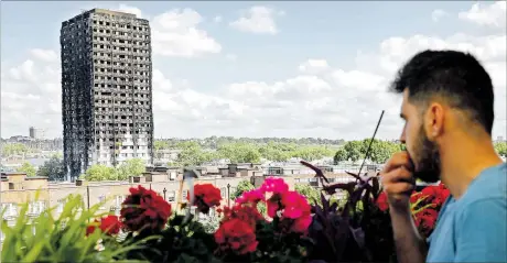  ?? [ APA ] ?? Das Gerippe des Grenfell Towers, der im Londoner Stadtteil North Kensington in der Nacht auf Mittwoch lichterloh brannte.