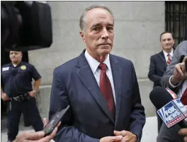  ?? THE ASSOCIATED PRESS ?? U.S. Rep. Chris Collins, R-N.Y., speaks to reporters Sept. 12as he leaves the courthouse after a pretrial hearing in his insider-trading case in New York.