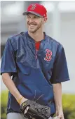  ?? STAFF PHOTO BY MATT STONE ?? NEW DELIVERY ARRIVES: Red Sox players are looking forward to playing with Chris Sale this season.