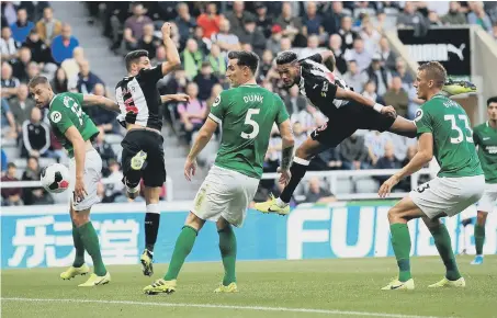  ??  ?? Joelinton sends a header wide against Brighton.