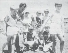  ??  ?? Warragul’s Little Aths relay team manager Tom Lowery gives some pointers on baton changing to David O’Dea (left) and Craig Martyn (right) while two other members of the under 9 100 metres relay team, Craig Brown and Alan Ross – along with 10 4 x 400 metres team of Stuart Hedley, Glen Davey, Alan Lowry and Peter Risstrom – look on. The two teams, winners at the first Gippsland Zone relay championsh­ips in Moe last Wednesday, will compete in State finals in Melbourne next month.