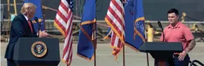  ??  ?? President Trump listens as shipyard worker Tyler Cahill speaks. Cahill is a U.S. Navy vet and has worked at the shipyard since 2012.