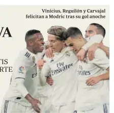  ??  ?? Vinicius, Reguilón y Carvajal felicitan a Modric tras su gol anoche