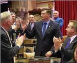  ?? PHOTO PROVIDED ?? Jake Ashby is welcomed on the New York State Assembly floor in Albany this past week after recently winning a special election for the 107th Assembly district.