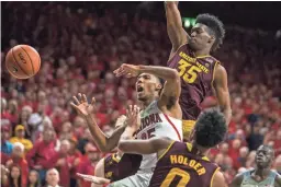  ?? SEAN LOGAN/THE REPUBLIC ?? Arizona’s Allonzo Trier loses control of the ball against Arizona State during the first half on Saturday at McKale Center in Tucson.