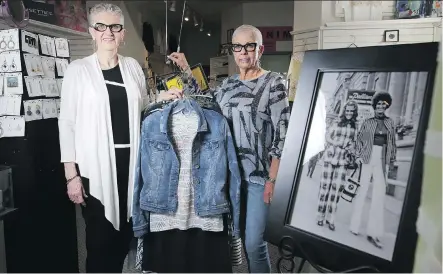  ?? LEAHHENNEL ?? Since 1968, sisters Suzanne Truba, left and Toni Thomas have been wrapping the women of Calgary in the finest of upscale boutique clothing and accessorie­s at their store Suzanne Truba Ltd., which has had three locations around the city but the same...