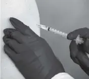  ?? DANIEL A. VARELA dvarela@miamiheral­d.co, file 2021 ?? The current vaccines appear slightly less effective against some variants. At the same time, they appear effective enough that scientists consider them protective against both the variants and the original virus strain.