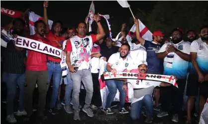  ?? ?? England fans gather outside the five-star Souq Al Wakra hotel, just south of Doha, to see their heroes. Photograph: Martin Rickett/PA