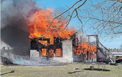  ?? NORFOLK COUNTY FIRE DEPARTMENT PHOTO ?? Fire destroyed a house near Port Dover and left several family pets unaccounte­d for on Monday.