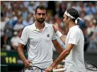  ?? GETTY IMAGES ?? Roger Federer consoles Marin Cilic after the men’s final.