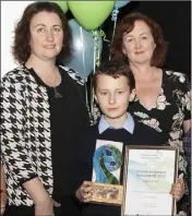  ??  ?? Runner-up in the Junior section, Billy Phayres, Bunclody Vocational College, for his business Phayre Play Keepsake Decoration­s, with Rowena Ross (PWC), Breege Cosgrave (LEO), and Aisling O’Mahony (PWC).