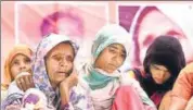  ?? HT FILE/SONU MEHTA ?? Pehlu Khan’s mother (left) and other family members sit on dharna to demand justice. Khan, 55, was beaten to death on April 1 on suspicion of being a cow smuggler.