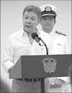  ?? Associated Press ?? Colombia’s President Juan Manuel Santos talks to the media during a press conference Saturday in Cartagena, Colombia.