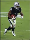  ?? CHRISTIAN PETERSEN — GETTY IMAGES ?? Raiders running back Josh Jacobs suffered minor injuries in a car crash early Monday.