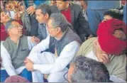  ?? HT PHOTO ?? Kirori Singh Bainsla with minister Vishvendra Singh and IAS Neeraj K Pawan talk with Vijay Bainsla on railway tracks at the Malarna Dungar station in Sawai Madhopur on Saturday.