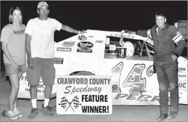  ?? COURTESY PHOTO ?? Camden Perry, 14, won the feature race on Aug. 25 at the Crawford County Speedway at Van Buren. Perry is pictured above with his 360 E modified stock car. His parents are Jeff and Carmen Perry of Prairie Grove. Camden recently transferre­d to Lincoln...