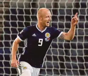  ?? REUTERS PIC ?? Scotland’s Steven Naismith celebrates scoring against Albania on Monday. Scotland won 2-0.