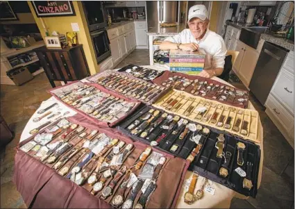  ?? Photograph­s by ALLEN J. SCHABEN Los Angeles Times ?? FREDRIC FRIEDBERG and his watches at his Irvine home. The collection represents 30-plus years of buying and researchin­g.