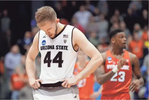  ?? JOE ROBBINS/GETTY IMAGES ?? Arizona State’s Kodi Justice reacts in the second half of Wednesday’s NCAA Tournament game against Syracuse in Dayton, Ohio. Justice led ASU with 15 points, but the Sun Devils’ season ended with a 60-56 loss.