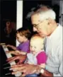  ?? PETER HVIZDAK - NEW HAVEN REGISTER ?? Walter Kaylin at his home in Old Lyme about 20 years ago with his granddaugh­ters, Natalie Beach and Charlotte Beach (on his lap). (Contribute­d by Jennifer Kaylin)