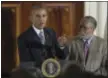  ?? THE ASSOCIATED PRESS ?? President Barack Obama, left, standing next to Lonnie Bunch, right, Director of the Smithsonia­n Museum of African American History and Culture, speaks at a reception for the museum opening at the White House in Washington, Friday.