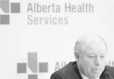  ?? Leah Hennel/Calgary Herald ?? Alberta Health Services official administra­tor Dr. John Cowell speaks about Dr. Chris Eagle’s resignatio­n on Thursday.