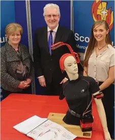  ??  ?? Student Lisa Finn with her prototype, teacher Mr Crotty and Scoil Mhuire principal Miriam Downey.