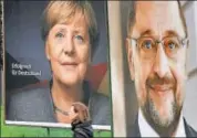  ?? REUTERS ?? Election posters of German Chancellor Angela Merkel and her main challenger Martin Schulz in Hamburg.