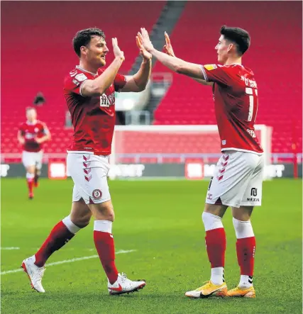  ?? Picture: Rogan Thomson/JMP ?? Chris Martin, left, celebrates with Callum O’Dowda after scoring against Wycombe