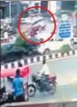  ?? CCTV ?? The speeding Mahindra XUV500 hit a scooty and a pedestrian. It went on to break through a wall before plunging into a drain.