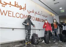  ?? Etihad Airways ?? Jose Aldo, centre, and his entourage arrived from Sao Paolo at Abu Dhabi airport yesterday