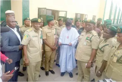  ??  ?? Minister of Interior, Ogbeni Rauf Aregbesola (middle) addresses officials of the Ikoyi Correction­al Centre in Lagos yesterday. With him is the Service Controller­General, Ja'afaru Ahmed (2nd left)