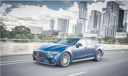  ?? MERCEDES-BENZ CANADA ?? The Mercedes AMG GT 63 S 4MATIC+ has an aggressive grille, slim LED headlights and subtle power bulges on the hood.