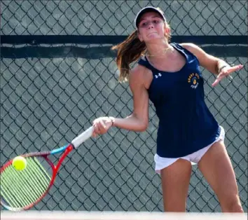  ?? Lucy Schaly/Post-Gazette photos ?? Shady Side Academy freshman Meriwether McCargo returns a shot in the Class 3A final Thursday at North Allegheny High School.