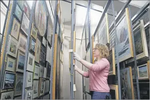  ?? SUBMITTED PHOTO ?? Savannah Anderson working in the Cape Breton University Art Gallery’s collection­s storage area.