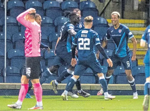  ??  ?? JUBILATION: Manny Duku celebrates after scoring to make it 3-3 in the Betfred Cup match at Stark’s Park.