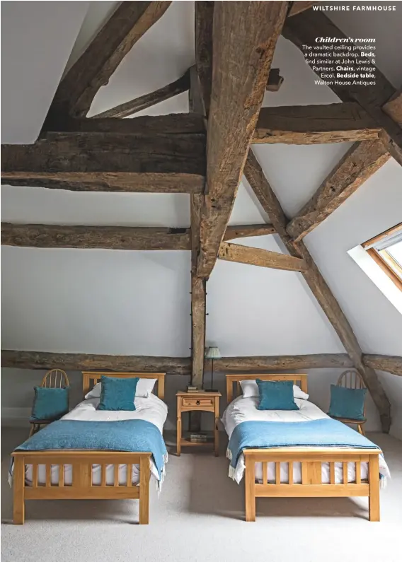  ??  ?? Children’s room
The vaulted ceiling provides a dramatic backdrop. Beds, find similar at John Lewis & Partners. Chairs, vintage Ercol. Bedside table,
Walton House Antiques
